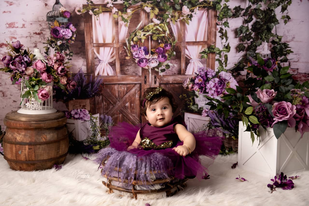 Six month baby photoshoot in Delhi baby girl purple flower theme