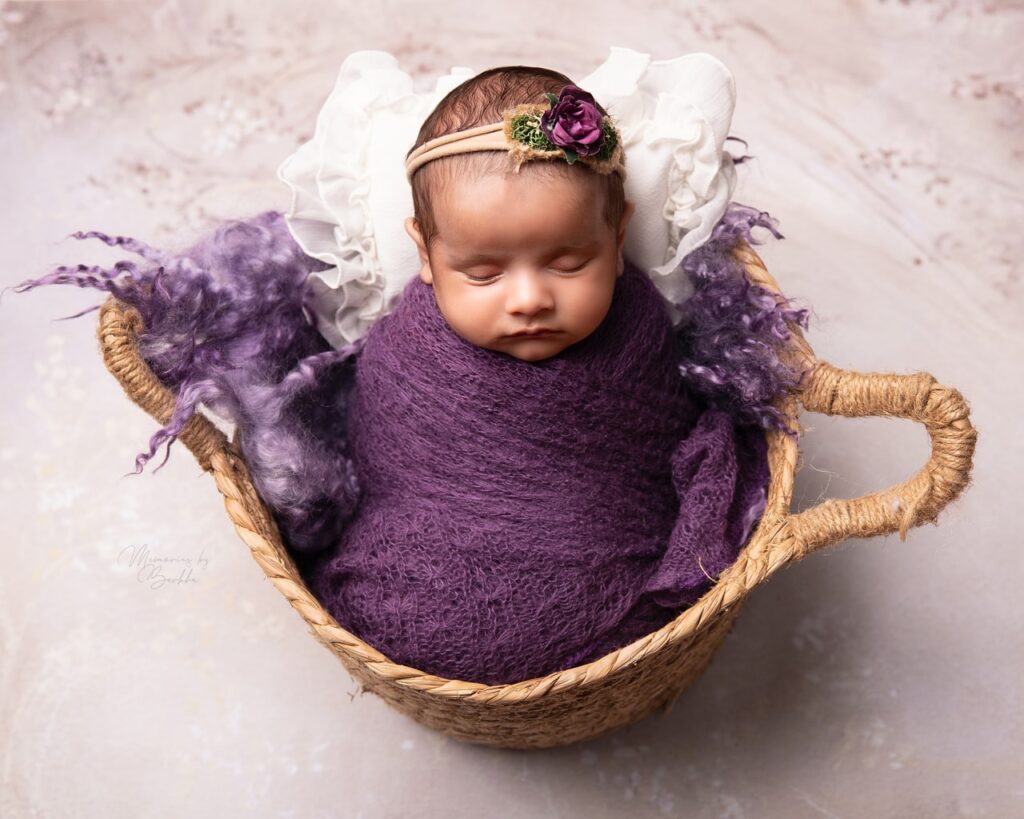 baby photoshoot in Delhi  basket prop, purple color