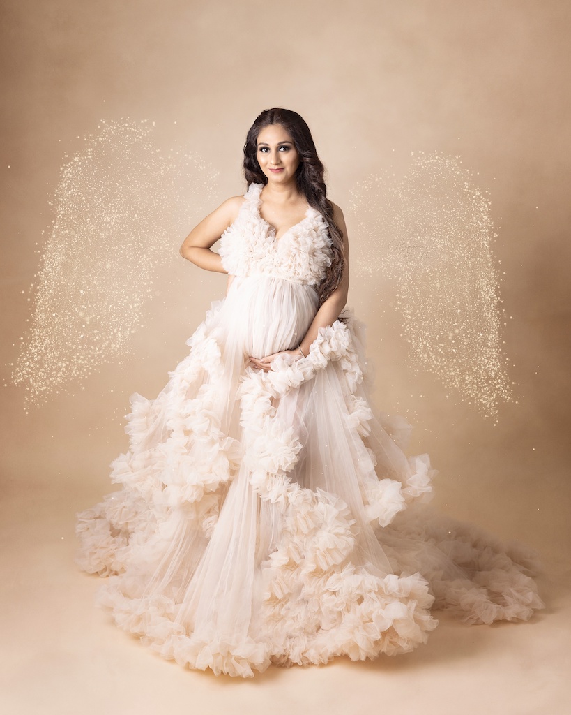 Lifestyle maternity photography in Delhi angelic wings shot