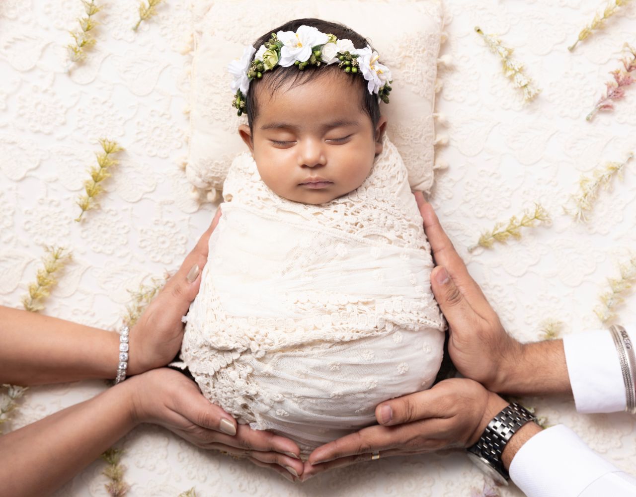 Capturing Tender Moments: Parent-Baby Poses